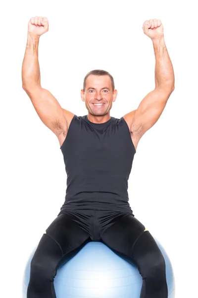 Man on gymnastic ball — Stock Photo, Image