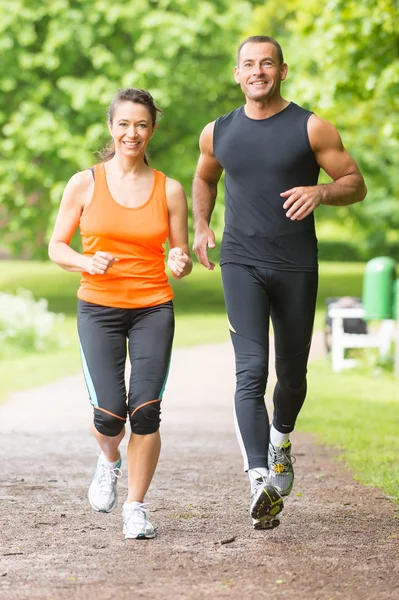 Sport couple running — Stock Photo, Image
