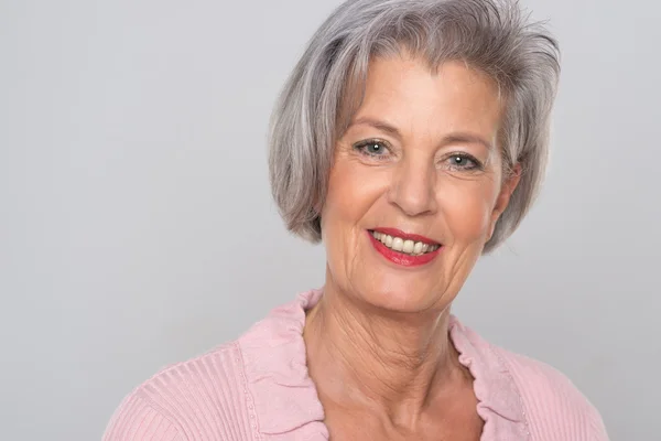 Smiling senior woman — Stock Photo, Image