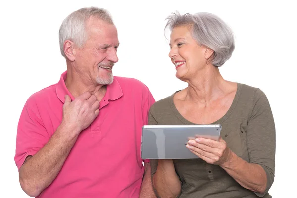 Senior couple with tablet — Stock Photo, Image