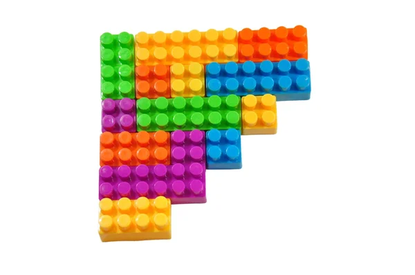 Іграшка барвистих пластикових блоків Ліцензійні Стокові Зображення