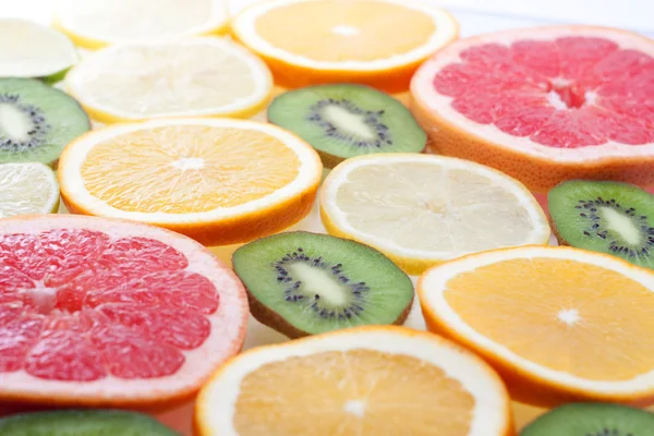 Mix of colorful citrus fruit on white — Stock Photo, Image