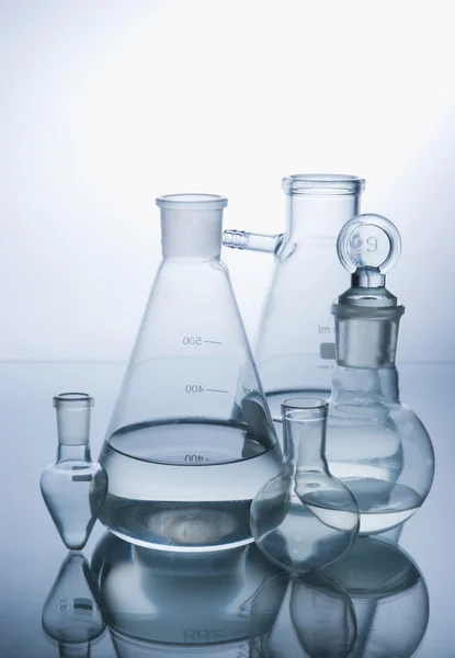 Laboratory glassware over white — Stock Photo, Image