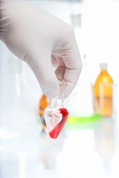 Test-tube with blue liquid isolated — Stock Photo, Image