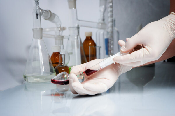 Test-tube with blue liquid isolated