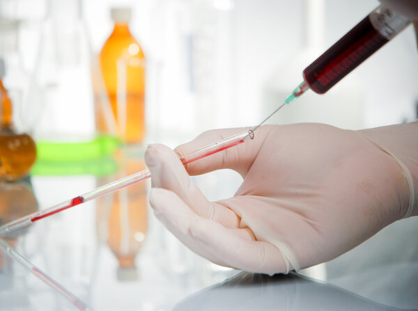 Test-tube with blue liquid isolated