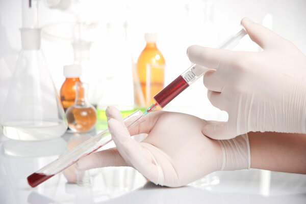 Test-tube with blue liquid isolated