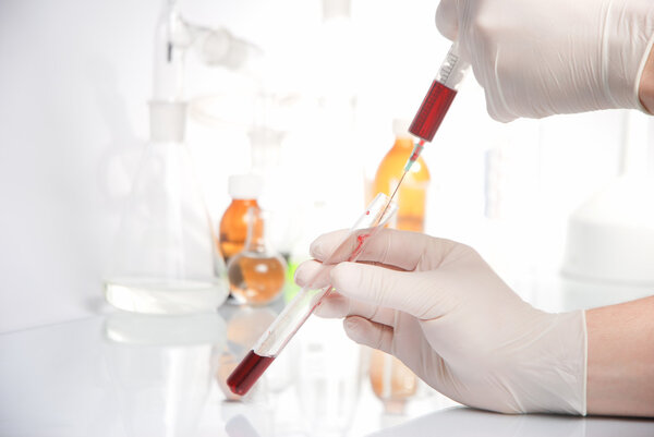 Test-tube with blue liquid isolated