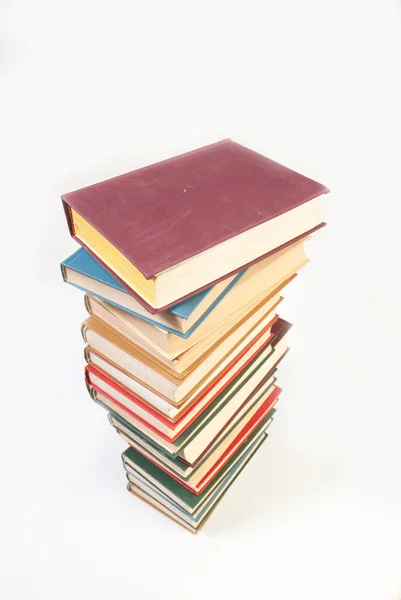 Montón de libros aislado en blanco — Foto de Stock