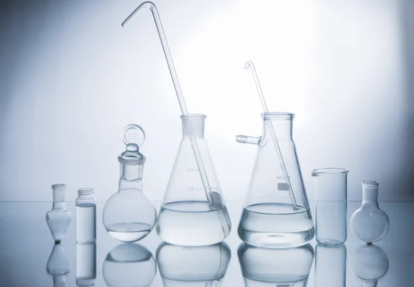 Glass chemical lab containers Stock Photo by ©Sonar 6276744