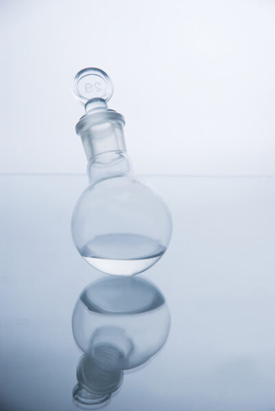 Laboratory glassware over white