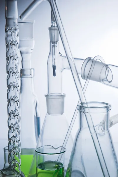 Laboratory glassware over white — Stock Photo, Image