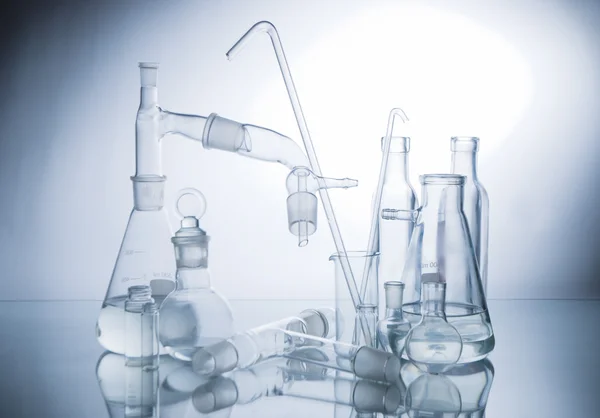 Laboratory glassware over white — Stock Photo, Image