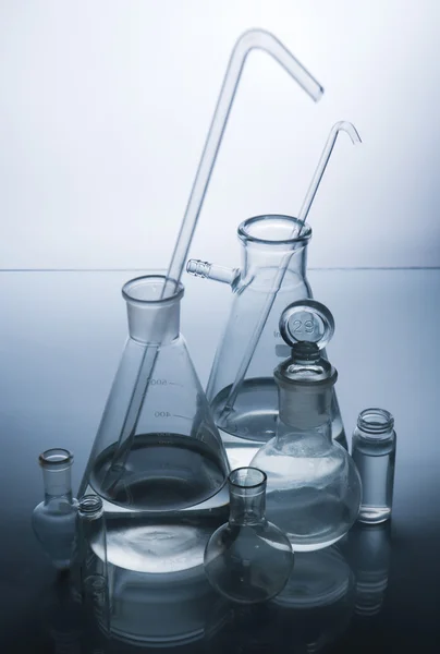 Laboratory glassware over white — Stock Photo, Image