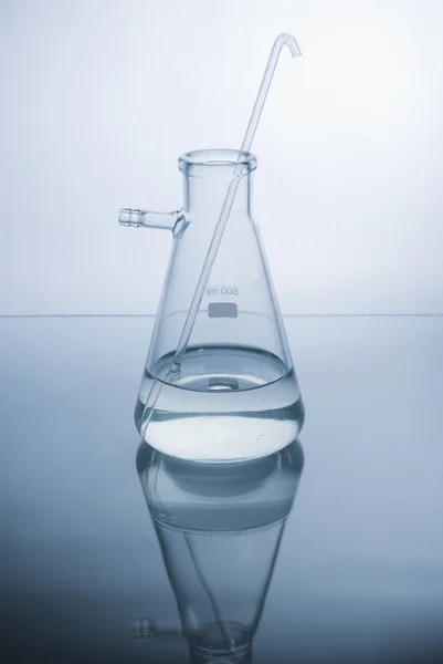 Test-tube with blue liquid isolated — Stock Photo, Image
