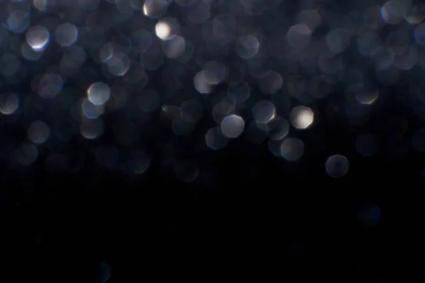 Bokeh circle with silver sparkles background. Grey glitter backdrop. Monochrome — Stock Photo, Image