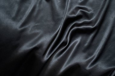 Siyah ipek arka plan. Saten kumaş dokusu. Koyu renkli, zengin zemin