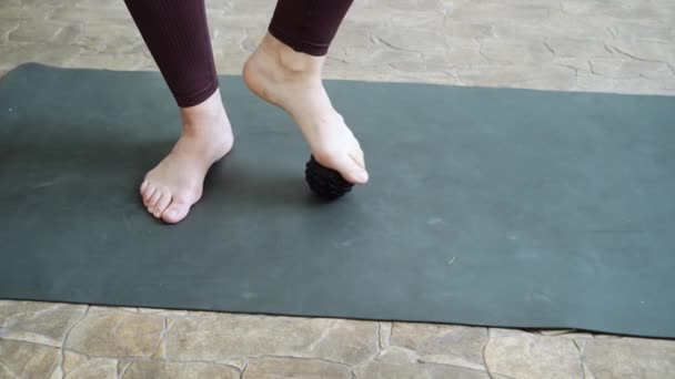 Young woman stretch body on fitness mat. Myofascial release massage. Relax — Vídeo de Stock