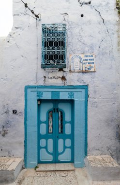 Blue door in Tunisia clipart