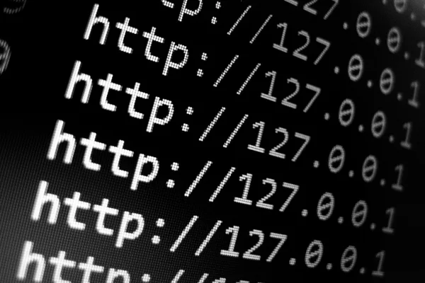 Localhost url в текстовом редакторе с черным фоном — стоковое фото