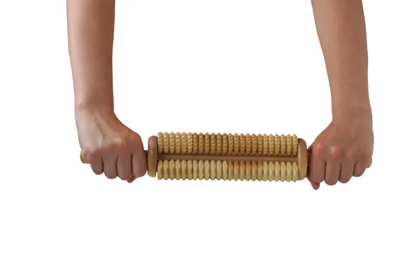 In the hands of a wooden massager — Stock Photo, Image
