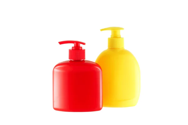 Två flaskor för hygieniska anordningar. rött och gult. — Stockfoto
