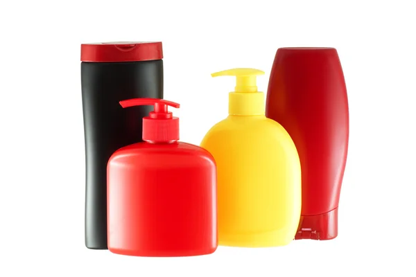 Grupp av fyra flaskor för hygienprodukter. — Stockfoto