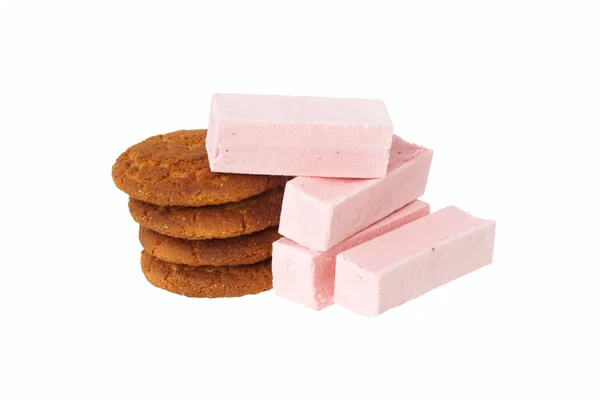 En gruppe lyserøde skumfiduser og havregryn cookies . - Stock-foto