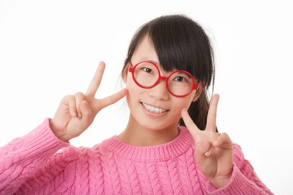 Beautiful Asian woman displaying a bit of attitude isolated on a white background Stock Image