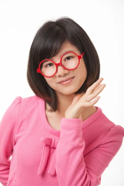 Beautiful Asian woman displaying a bit of attitude isolated on a white background — Stockfoto