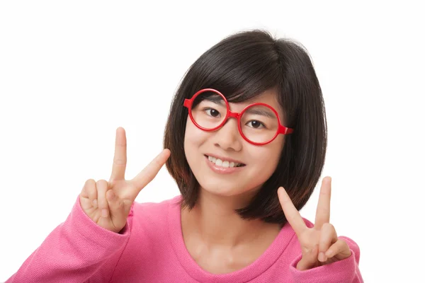 Beautiful Asian woman displaying a bit of attitude isolated on a white background Stock Photo