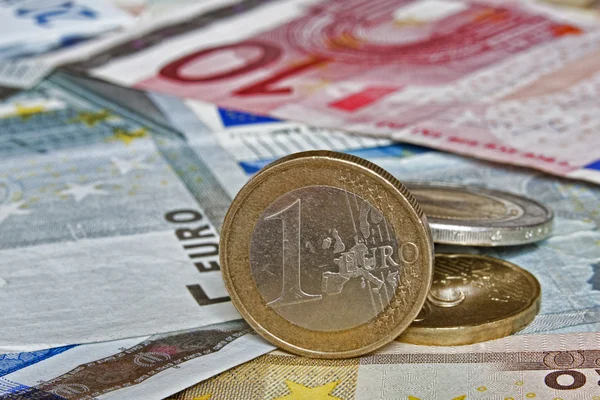 Close-up patroon van euro papiergeld en munten — Stockfoto