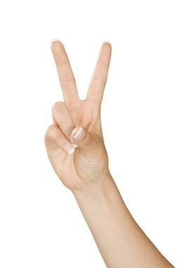 Caucasian female using hand gestures to say peace or victory isolated on a white background with a clipping path