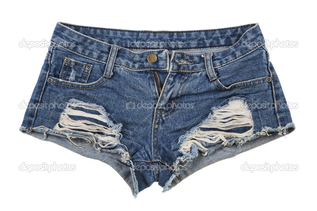 Old and worn blue jean shorts isolated on a white background