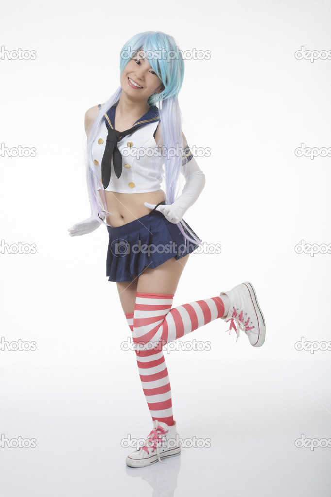 Beautiful and sexy Asian woman having some fun with cosplay isolated on a white background