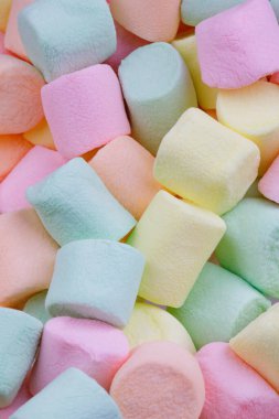 Renkli pastel şekerlemelerin arka planını kapat