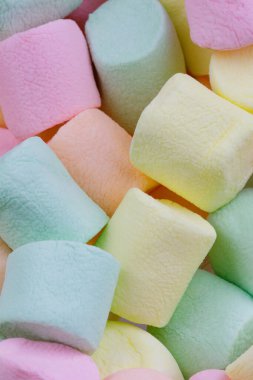 Renkli pastel şekerlemelerin arka planını kapat