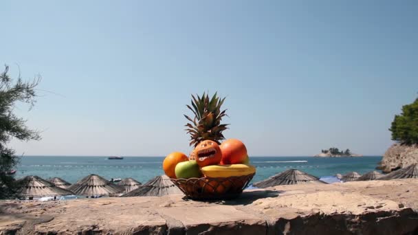 Fresh Fruit Basket Against Seaside — Stock Video