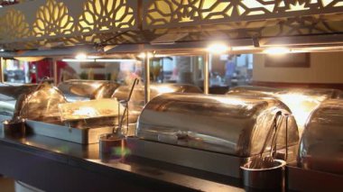 Many Buffet Heated Trays in Luxury Hotel Restaurant. Catering Buffet. All inclusive Hotel. Buffet Manu. Self-Service Restaurant.