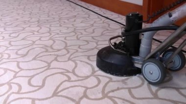 Cleaning And Maintenance Of Hospitality Carpet. Hand Push Washing Machine For Hotel Carpet Cleaning. Worker With Carpet Cleaning Machine Cleaning Hotel Corridor Carpet.