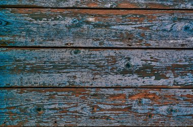 Karanlık arka planda soyut yakın plan. Tasarım elemanı. Grunge metal arka planı, paslı çelik dokusu. Duvarda çizikler var. Eski kirli yüzey. Metal rengi.