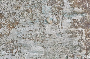 Karanlık arka planda soyut yakın plan. Tasarım elemanı. Grunge metal arka planı, paslı çelik dokusu. Duvarda çizikler var. Eski kirli yüzey. Metal rengi.