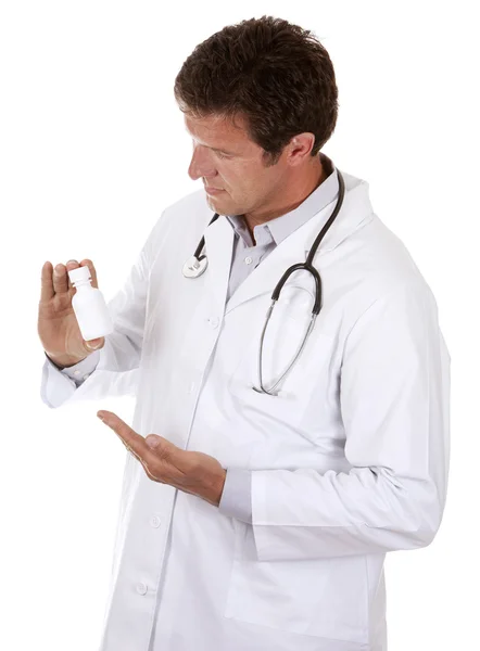 Doctor holding pills — Stock Photo, Image