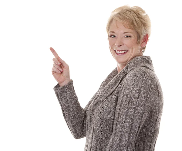 Casual woman pointing — Stock Photo, Image