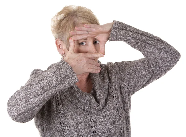 Mujer mostrando marco — Foto de Stock