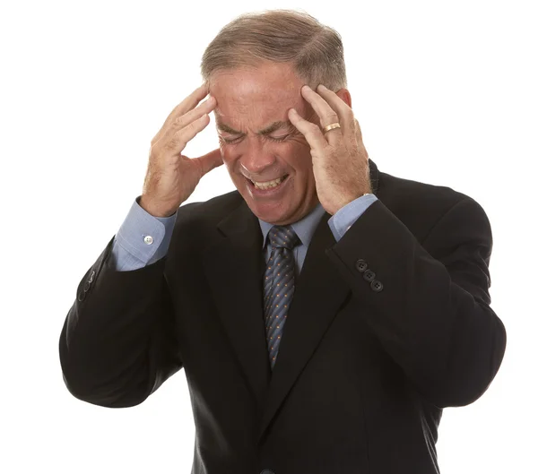 Hombre de negocios senior con dolor de cabeza — Foto de Stock