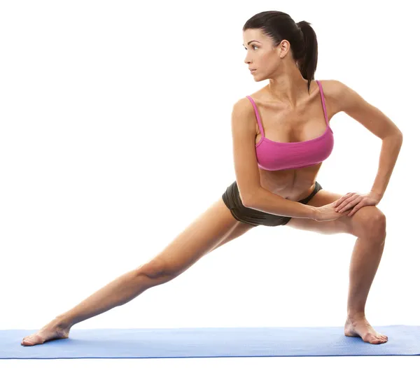 Mujer haciendo yoga — Foto de Stock