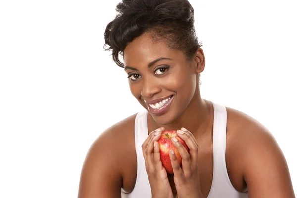 Vrouw met een appel — Stockfoto