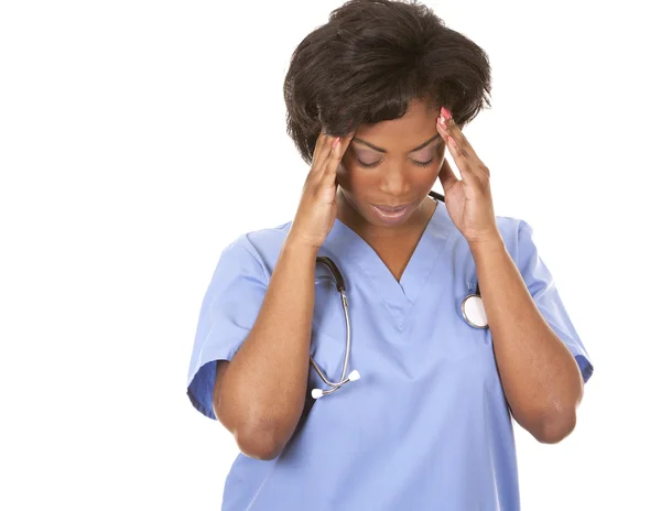 Pielęgniarka o ból głowy — Zdjęcie stockowe