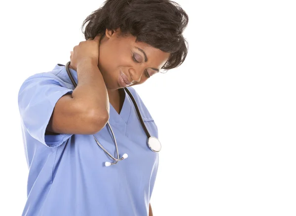 Enfermera teniendo un dolor de cuello — Foto de Stock